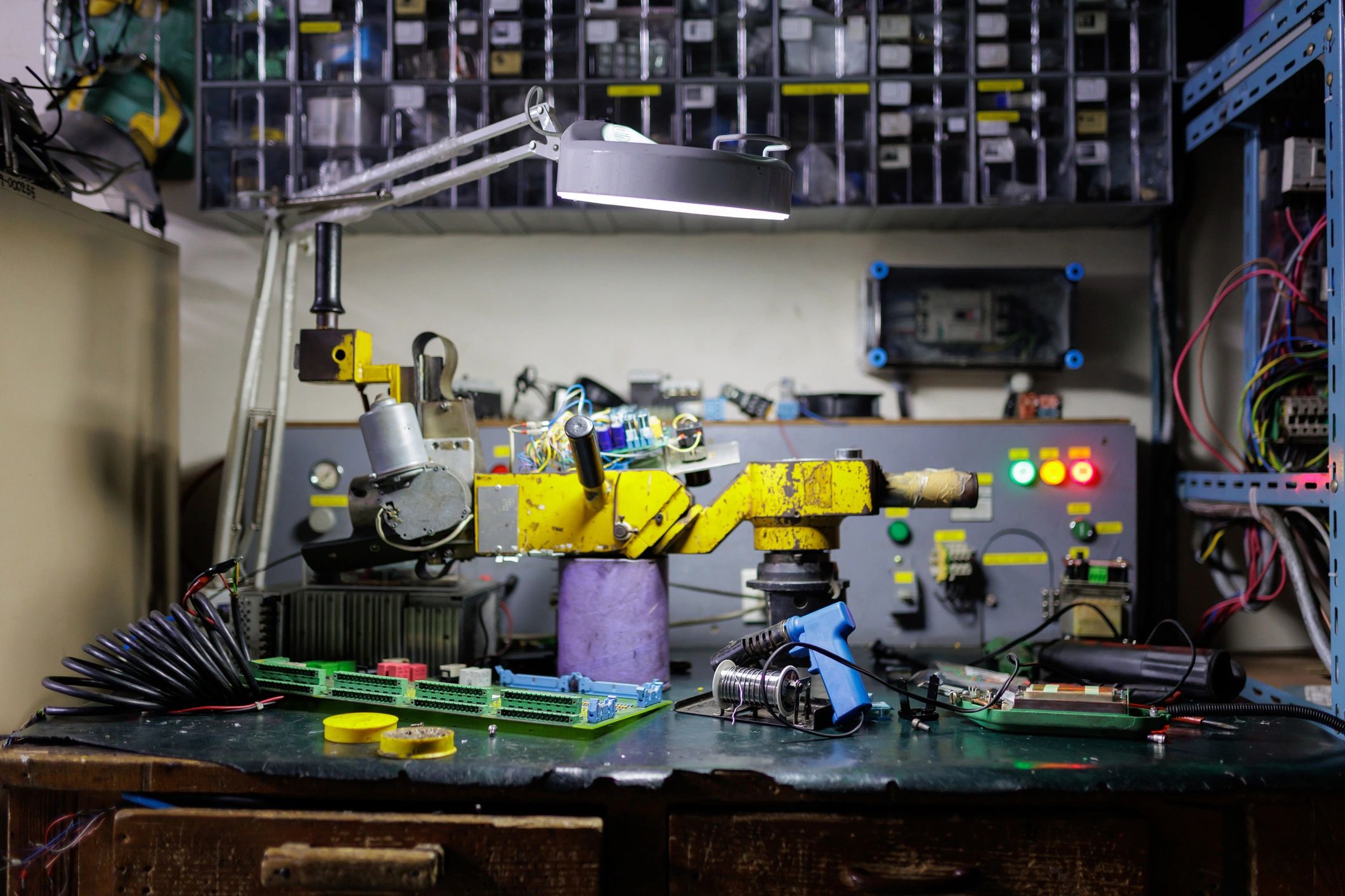 Electronics workshop with circuit board testing equipment
